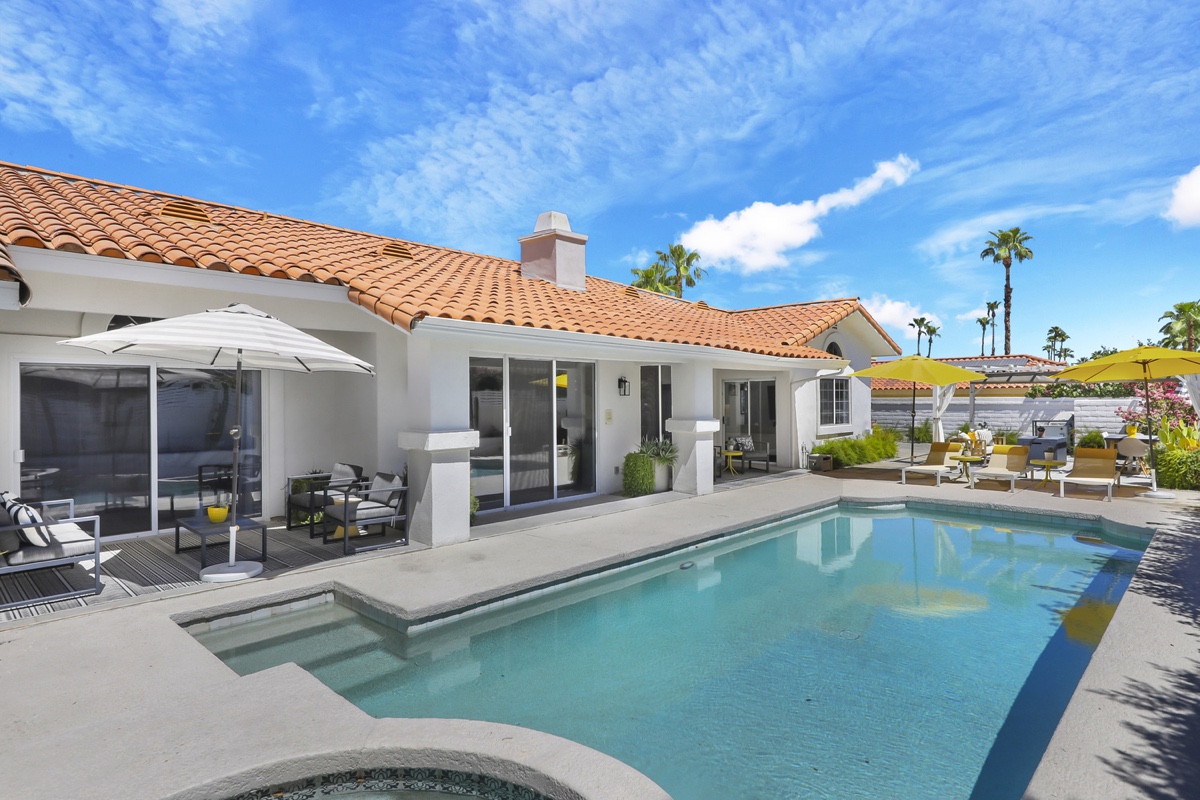 House, pool and pergola in daylight at 74797 S Cove Drive